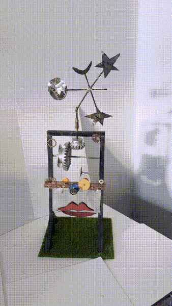 'Lips' wind-powered  kinetic sculpture moquette for grant proposal: Welded steel, found objects.